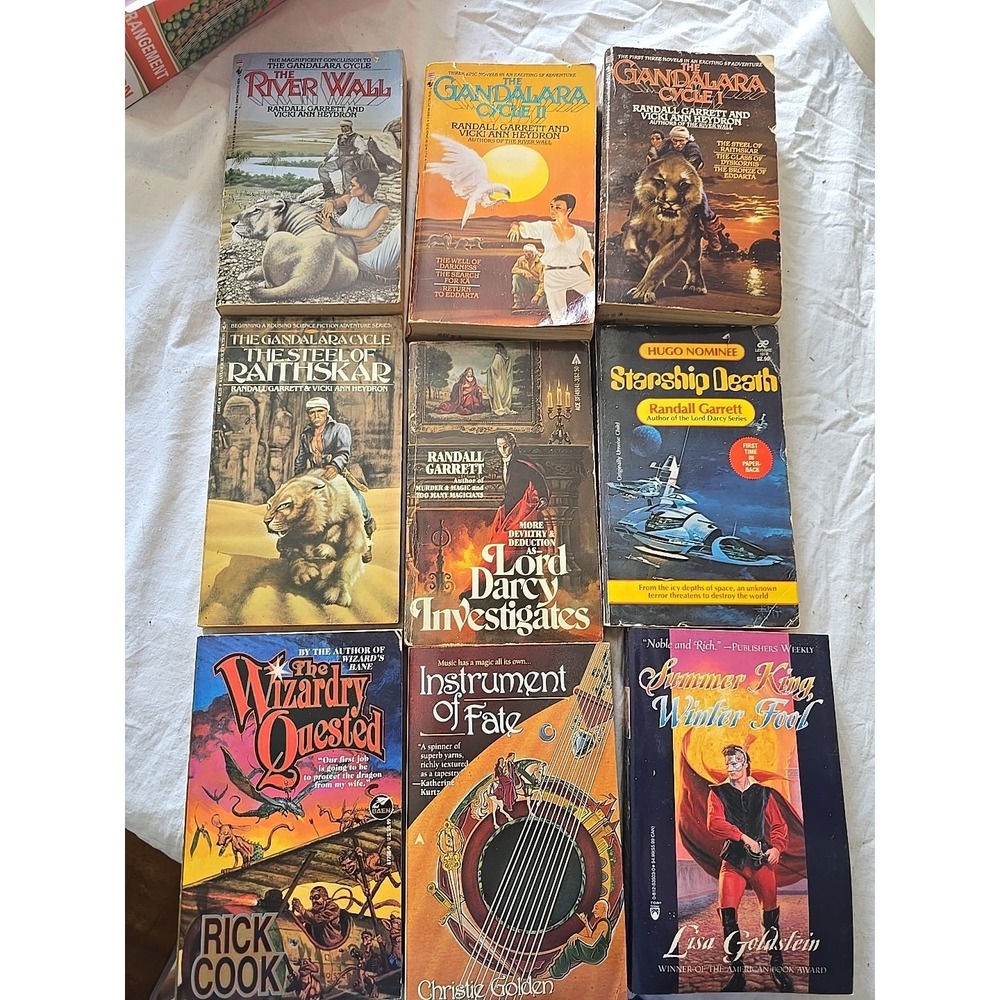 Lot of 9 Randall Garrett, Lisa Goldstein, Rick Cook & Christie Golden‎ PB Books
